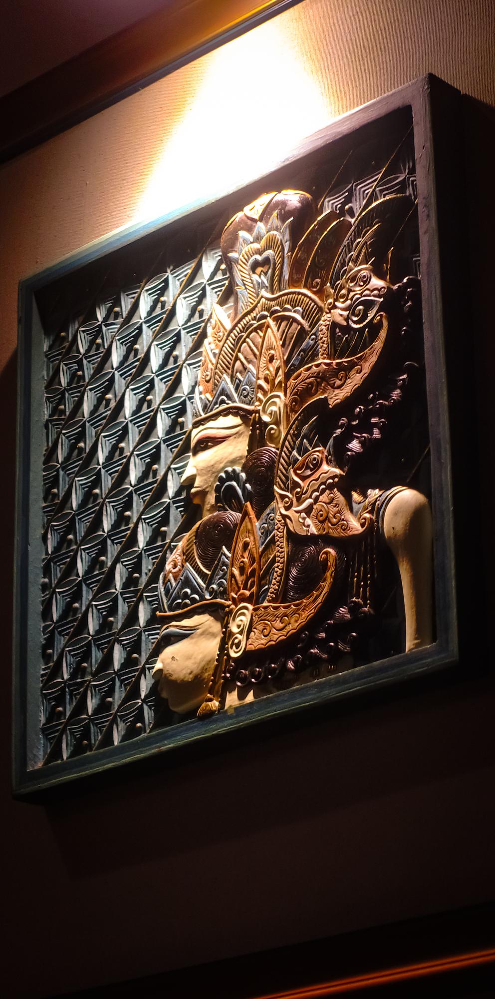 framed embroidered panel with botanical motif